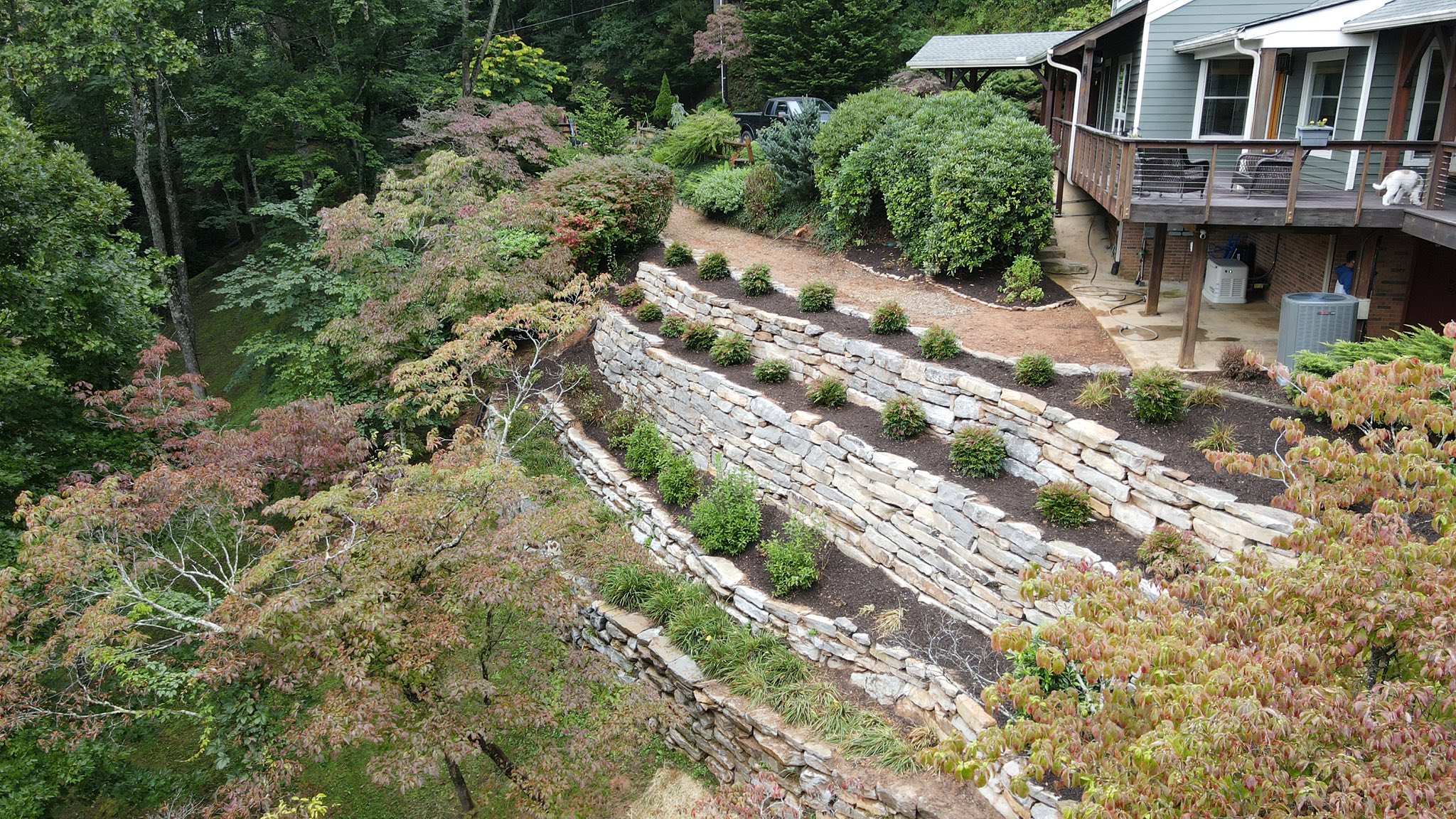 Steep retaining walls and garden area