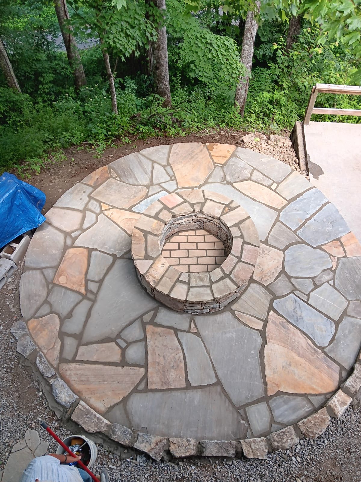 Stone fire pit with seating area