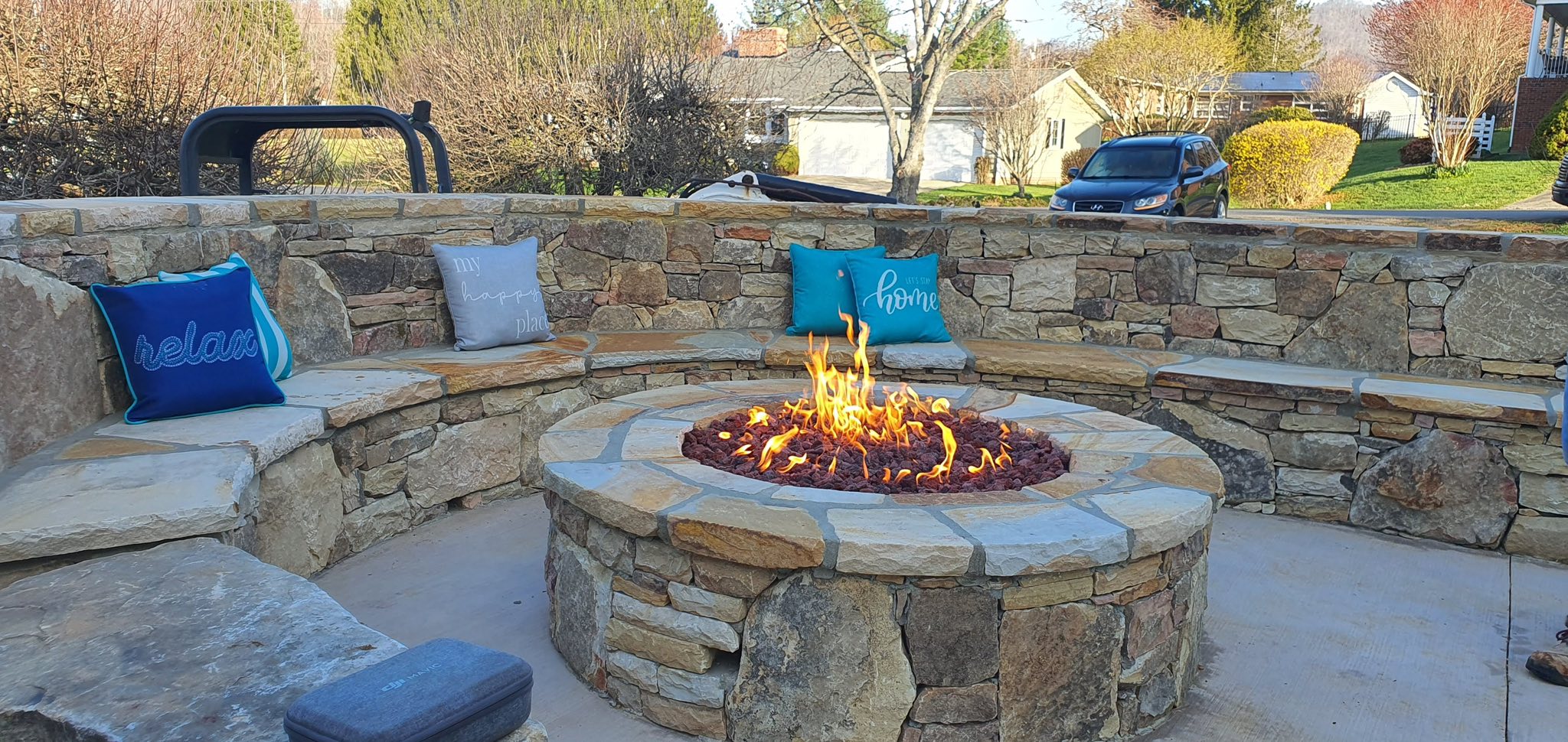 Stone fire pit with outdoor seating