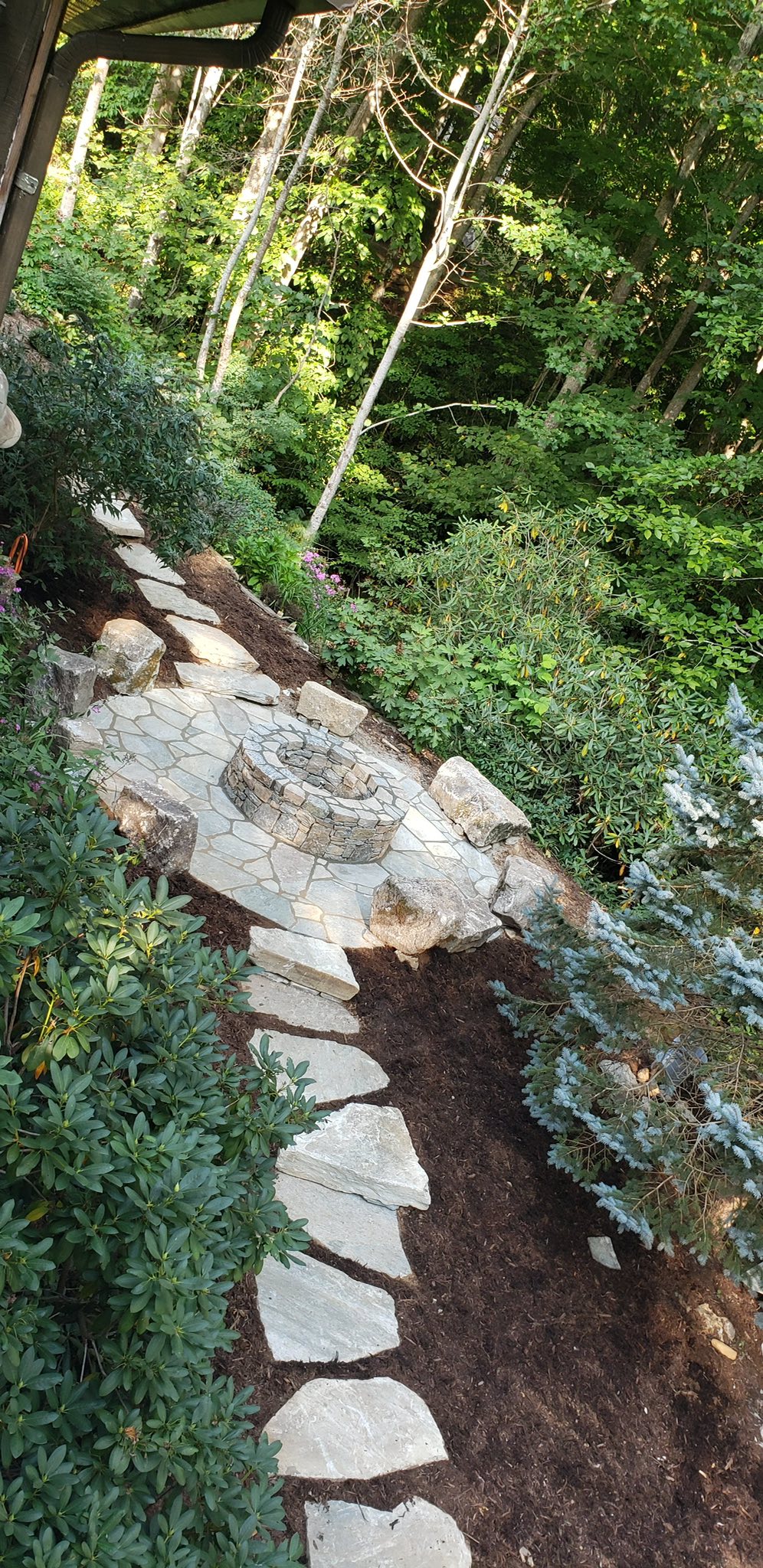Outdoor fire area with stone seating