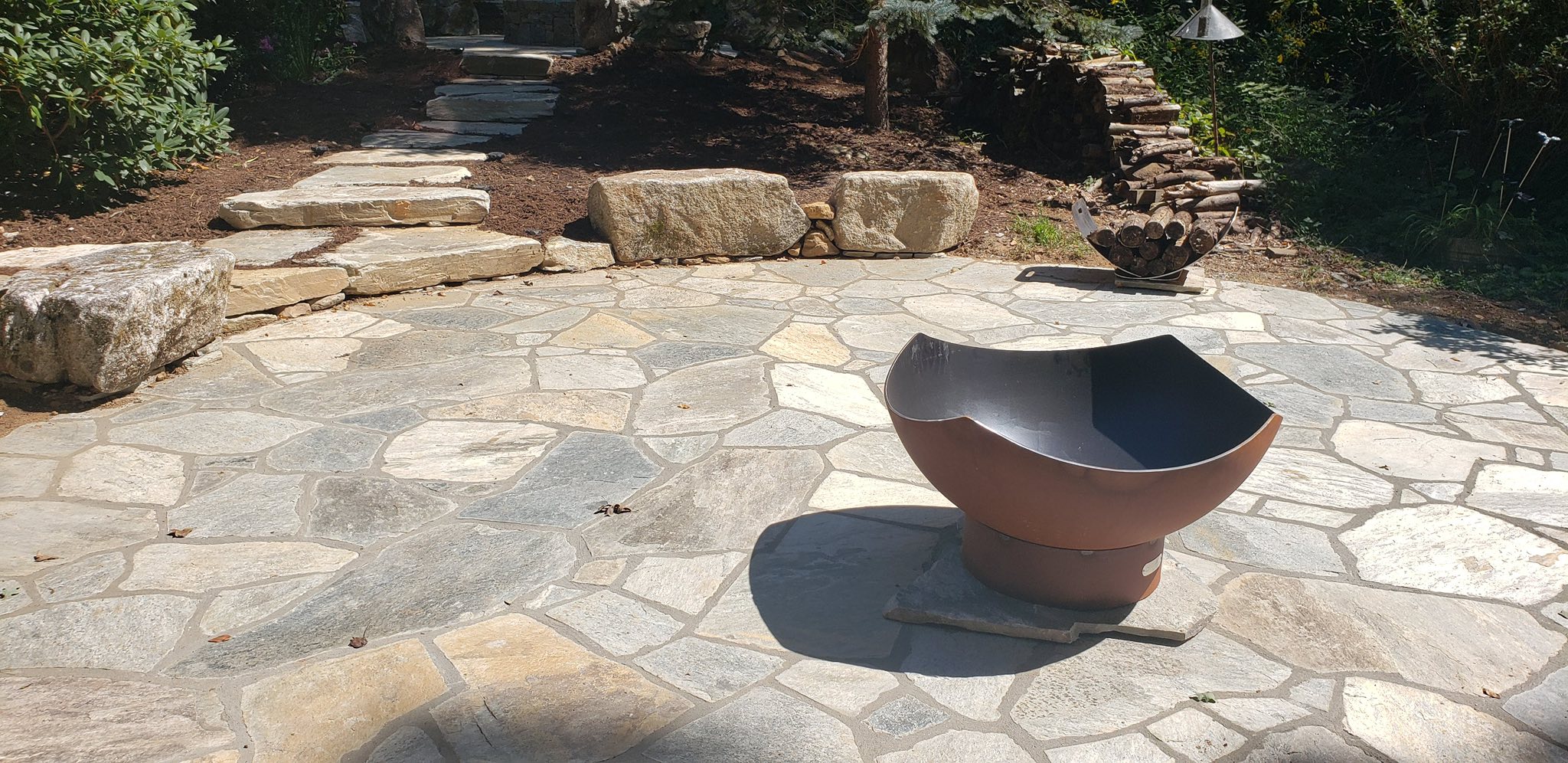 Stone patio with outdoor seating area