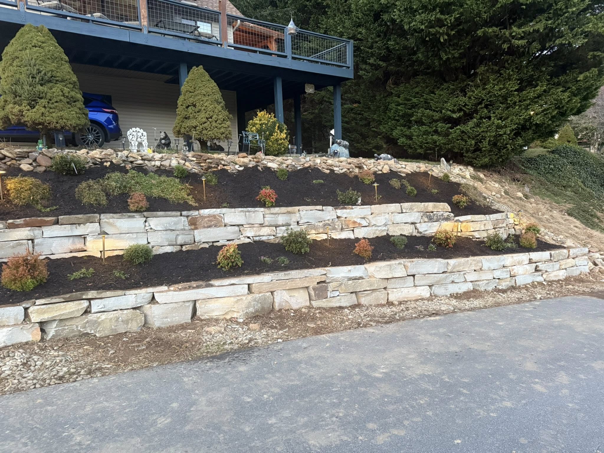 Tiered stone retaining walls